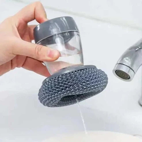 Steel dish scrubber brush with liquid dispenser